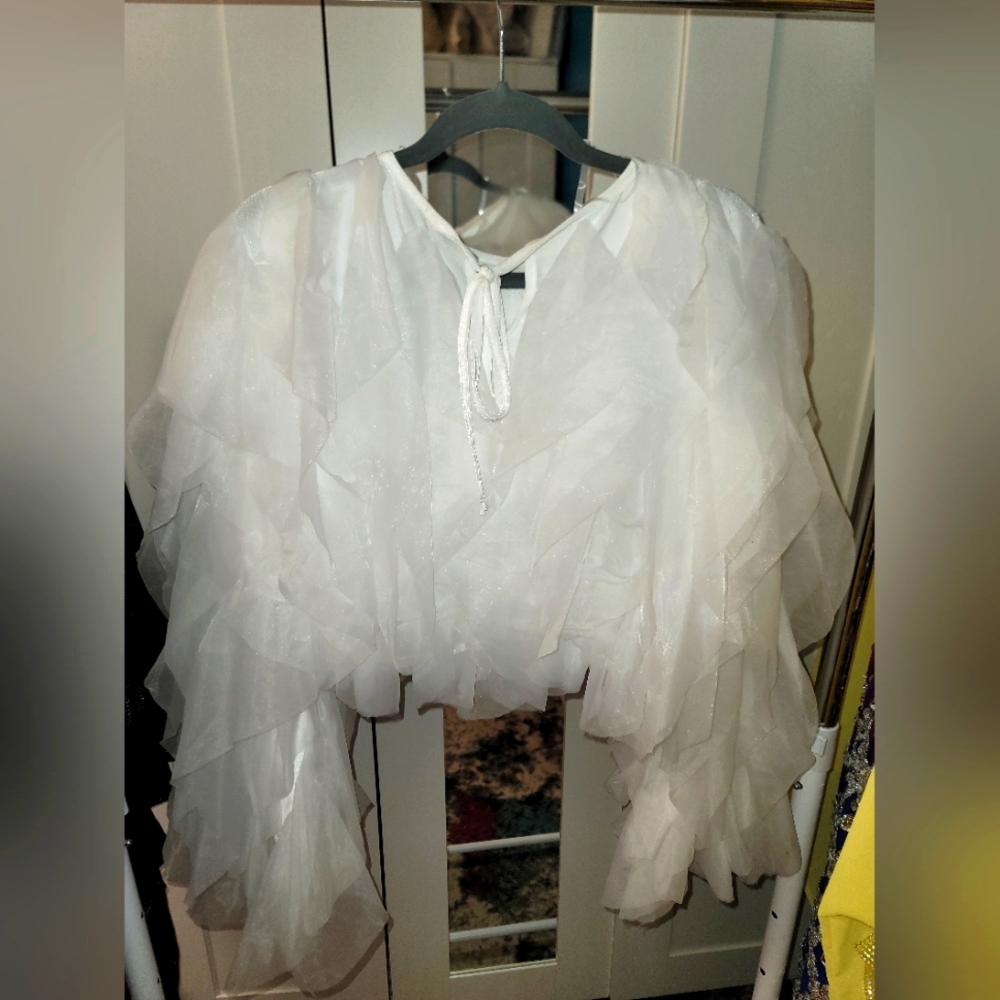 Amazing white dressy blouse wear with any pair of pants or pencil skirt